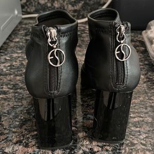 Franco Sarto black leather booties with zip up in back